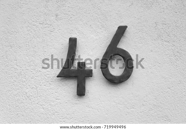number-46-house-number-on-wall-stock-photo-719949496-shutterstock