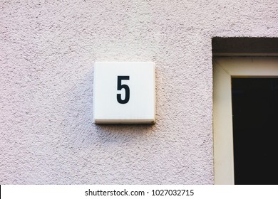 Number 5 Door Sign On Grudge Facade