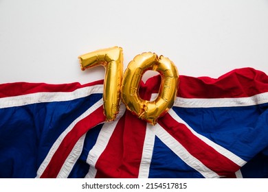 Number 70 balloons on a united kingdom union jack flag - Shutterstock ID 2154517815