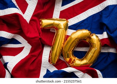 Number 70 balloons on a united kingdom union jack flag - Shutterstock ID 2155237561