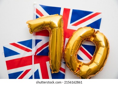 Number 70 balloons on a united kingdom union jack flag - Shutterstock ID 2156162861