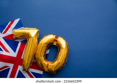 Number 70 balloons on a united kingdom union jack flag - Shutterstock ID 2156652399