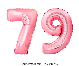 Number 79 seventy nine of rose gold inflatable balloons isolated on white background. Pink helium balloons forming 79 seventy nine