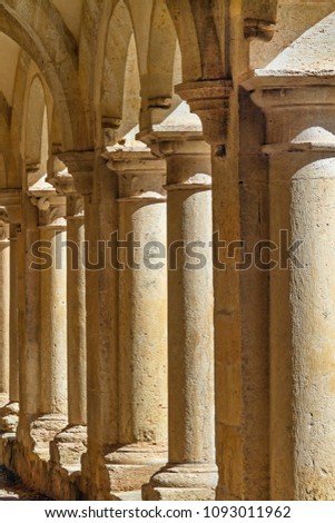 A number of columns and arches in the yard of the ancient monastery