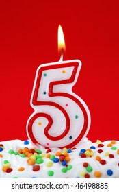   Number Five Birthday Candle On Red Background