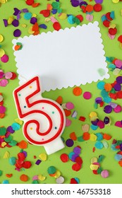 Number Five Birthday Candle On Green Background