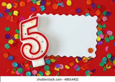 Number Five Birthday Candle On Red Background