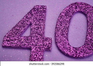Number forty purple color over a purple background. Anniversary. Horizontal