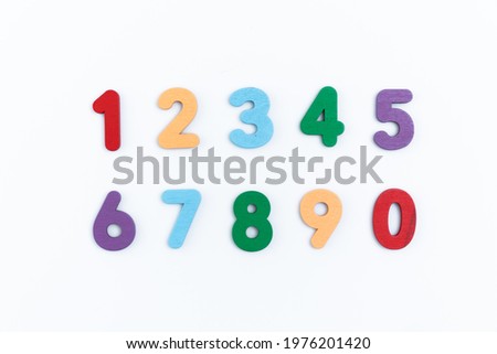 number on white background. Colorful letters on background closeup. Alphabet toy