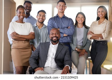 The Number One Team In The Game. Cropped Portrait Of A Diverse Group Of Businesspeople Posing In Their Office.