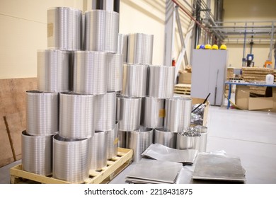 A Number Of Rolls Of Aluminum Lies In The Production Shop Of The Plant. Metal Processing, Aluminum Plant. Bags With Recycled Raw Materials Are Recycled.