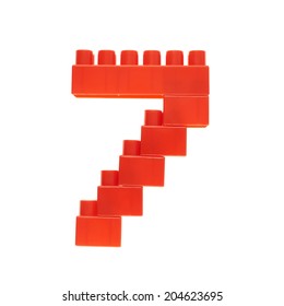 Number Seven Made Of Toy Construction Building Bricks Isolated Over The White Background