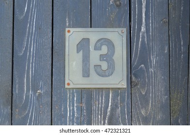 Number Thirteen. House Number.