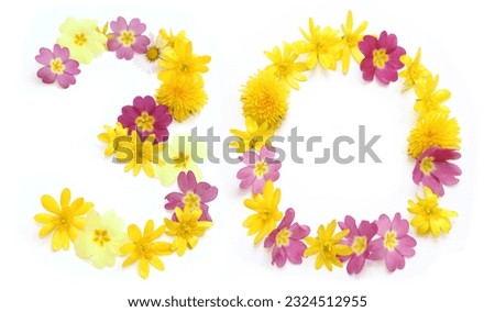The number thirty 30, a three 3 and a zero 0 made from freshly picked yellow and pink flowers. 
for birthdays and anniversaries, wedding celebrations, corporate events, isolated on a white background