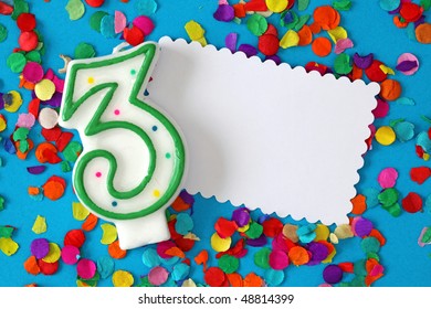  Number Three Birthday Candle On Blue Background