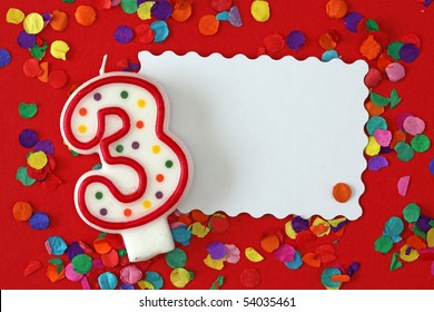 Number Three Birthday Candle On Red Background