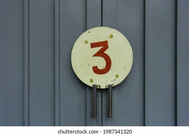 Number Three On Door In Old Gymnasium