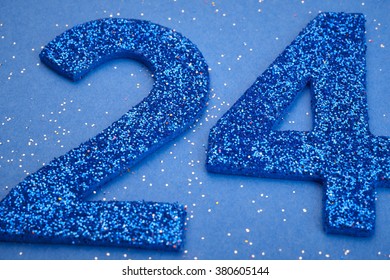 Number twentyfour blue color over a blue background. Anniversary. Horizontal