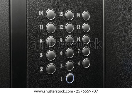 numbered floor buttons in elevator of multi-storey building
