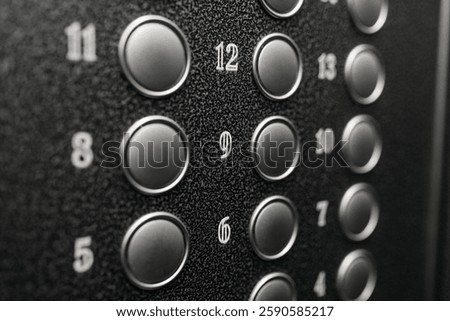 numbered floor buttons in elevator of multi-storey building