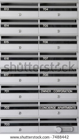 Numbered Silver Metal Mailboxes With Locks In Rows