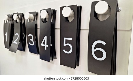 Numbered tags. Organization system for sequential tracking.