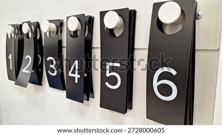 Numbered tags. Organization system for sequential tracking.