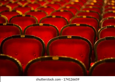 Numbered Theater Chairs With Red Velvet 