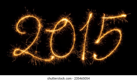 The numbers 2015 set in sparkly handwriting design on black background.