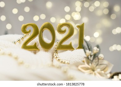 Numbers 2021 on Golden bokeh background New year mood, Christmas, greeting card, new year background - Shutterstock ID 1813825778