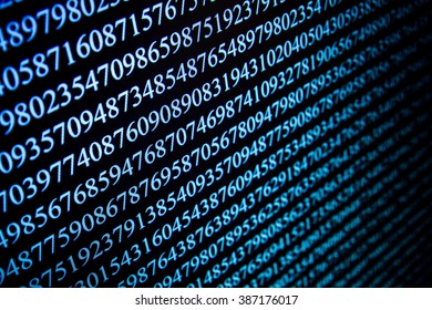 Numbers on computer screen. Macro photography with visible pixels.