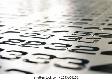 The numbers are randomly going into the distance. The numbers cut into the sheet go into blur.