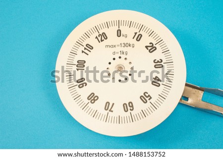 Numbers for weight scale isolated on blue background