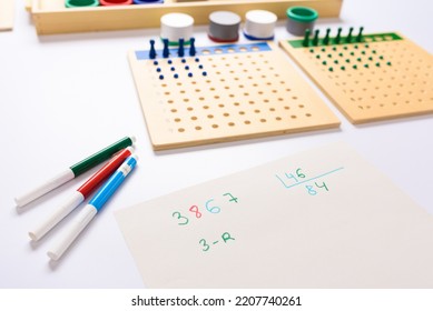 A Numerical Division Carried Out Following The Montessori Method.