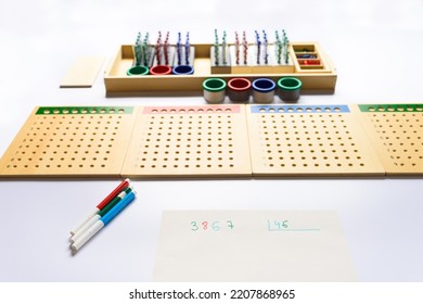 A Numerical Division Carried Out Following The Montessori Method.