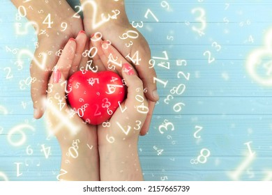 Numerology, A Heart In The Hands Of A Girl In Male Hands, Surrounded By Numbers, The Concept Of Love