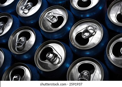 Numerous Aluminum Soda Pop Cans Over Black, Open.