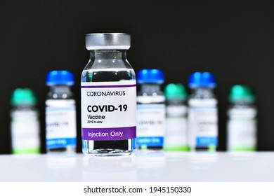 Numerous Different Color Brand Glass Bottles Containing The Covid19 Coronavirus Vaccine