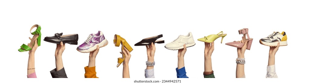 Numerous people's hands holding stylish trendy footwear, isolated on a white background with copy space. Banner for the website header. Shoe sale marketing campaign. - Powered by Shutterstock