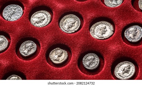 Numismatics.Authentic silver denarius, antoninianus of ancient Rome. A collector holds an old coin.Ancient coin of the Roman Empire
