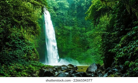 Nungnung Waterfall in Bali, Indonesia - Powered by Shutterstock
