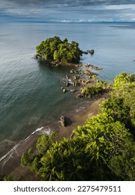 Nuqui choco jungle forest rock ocean beach colombian pacific coast pristine natural lanscape aerial nature palm trees and mountains