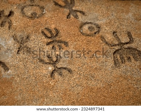 nuragic stone age old petroglyphs runic writings inside Sea Oxen Grottoes Sardinia Italy 