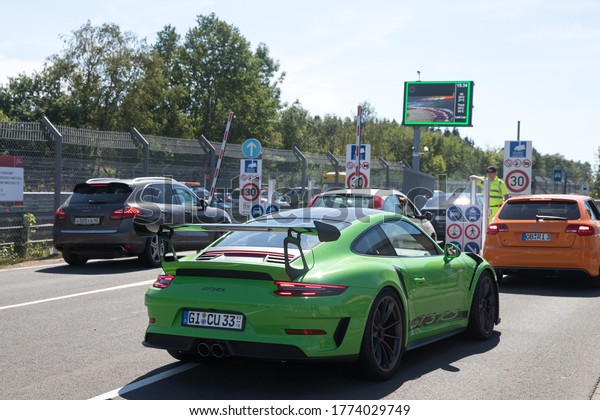 Nurburgring, Cars waiting at the entry gate.\
Racetrack. Germany. August 5,\
2018