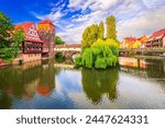 Nuremberg, Germany. Colourful and picturesque view of the half-timbered old houses,  oldf Nurnberg on the banks of the Pegnitz river. Tourist attractions in Franconia.