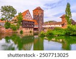 Nuremberg, Germany. Colourful and picturesque view of the half-timbered old houses, old Nurnberg on the banks of the Pegnitz river. 