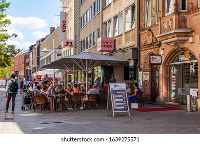 Nuremberg, Germany, On August 21, 2018. People Have Rest In Typical Cafe In Old Town