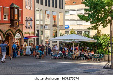 Nuremberg, Germany, On August 21, 2018. People Have Rest In Typical Cafe In Old Town