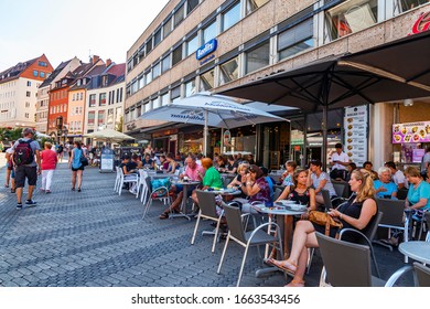 Nuremberg, Germany, On August 21, 2018. People Have Rest In Typical Cafe In Old Town