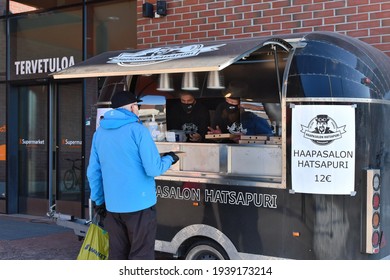 Nurmijarvi, Finland -03-19-2021: Actor Ville Haapasalo Working At His Khachapuri Food Truck Selling Georgian Cheese Bread, Imeruli. Ville May Be More Famous In Russia Than In His Native Finland. 